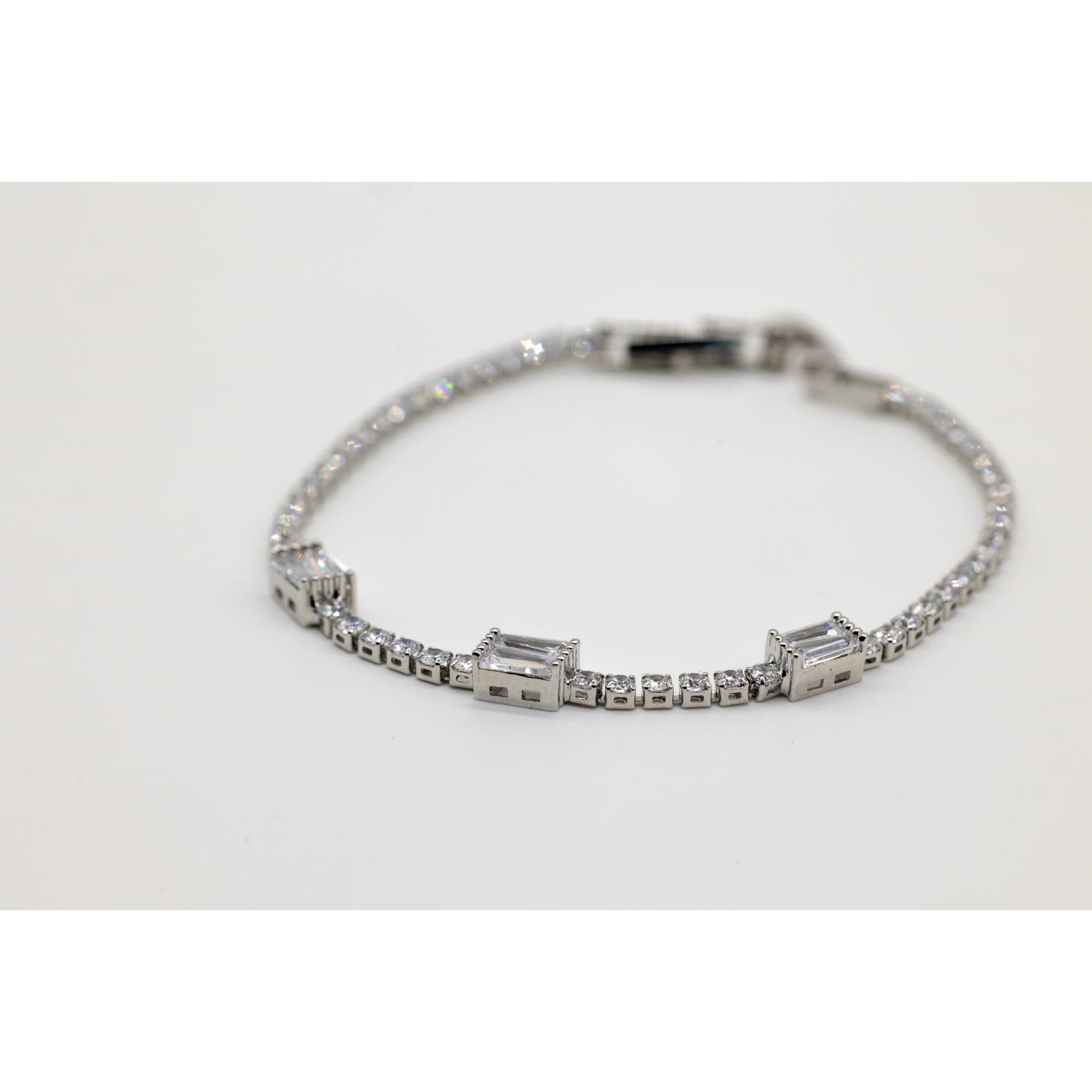 White 3 stone Single strand bracelet